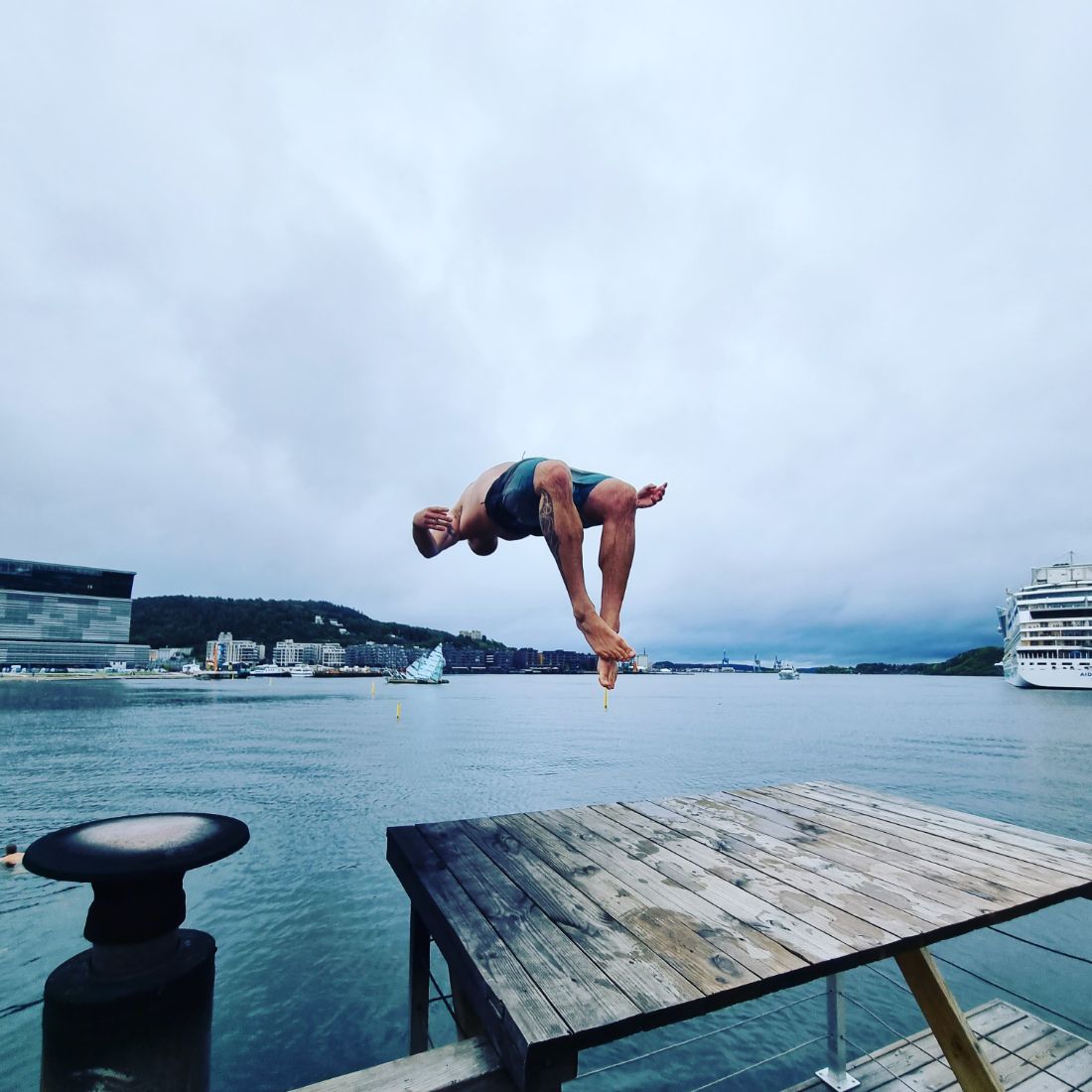 Marijn mid-backflip into the harbor